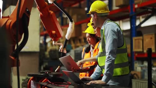 Engineer team working together in the factory