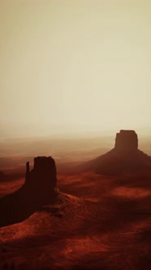 Arid Landscape With Distant Rocks