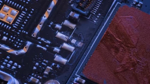 Different types circuits and chip lie on table tracking macro close up. Microcircuits background