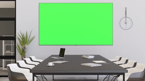 Conference room with blank green TV screen. Monitor mock up with Chroma Key. Business meeting room