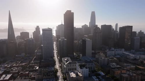 A Stunning Aerial View Showcasing the San Francisco Skyline Against an Urban Landscape Backdrop