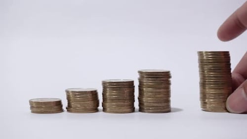 Stacks of Gold Coins Grow
