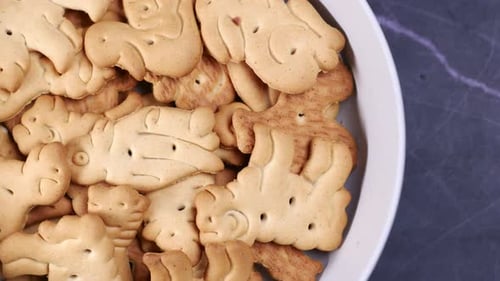 Close Up of Sweet Cookies for Child in a Bowl