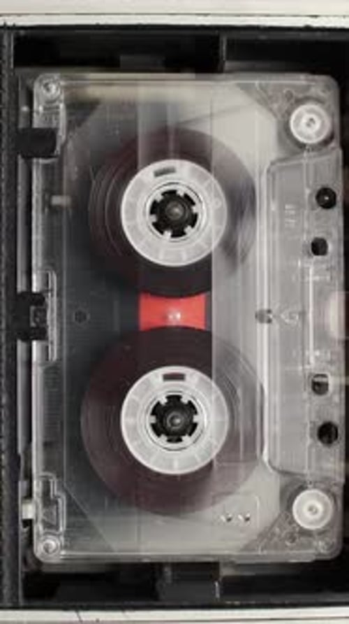 Rotating Cassette Tape Playing Inside Player