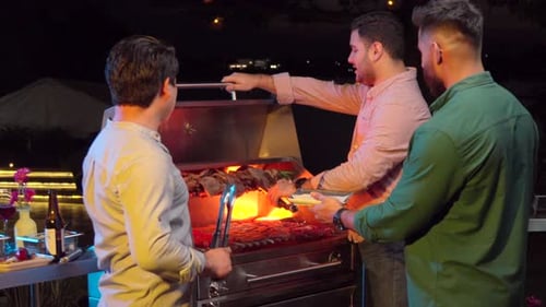 Friends latin mexican at barbecue night party garden grill fire steak raw meat sausage waiters champ