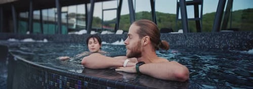 Close Up Couple Man and Woman Standing in Swimming Pool Smiling Feel Happy Outdoors Relax Time