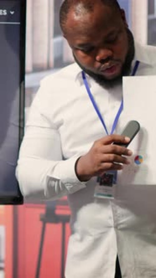 Man Giving Business Presentation in Bright Workplace