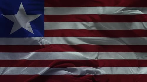 Waving Flag of Liberia in Realistic Textile Fabric