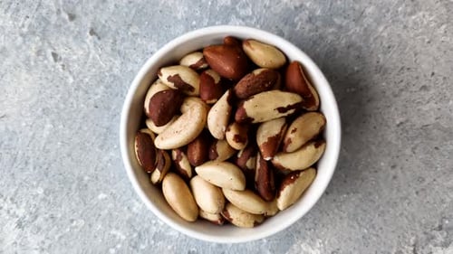 Brazil nuts, raw and shelled, are a source of selenium and a healthy food ingredient. Brazil nuts