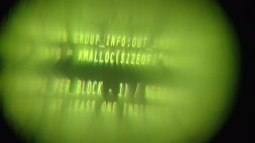 Code getting written on a screen seen through a trippy fisheye lens VR