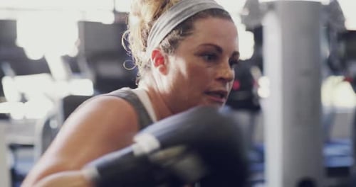 Woman Boxing at the Gym During a Workout
