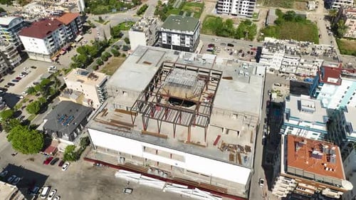 Aerial View Final Stage of Commercial Complex Construction Transforming Skyline with Architectural