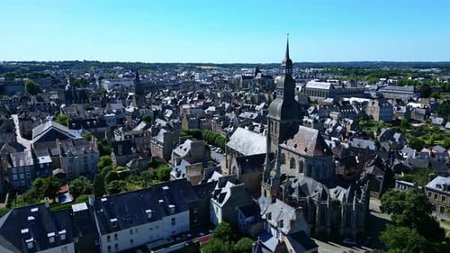 Clock tower or the Tour de l'Horloge architecture, Dinan, France. Aerial drone backward