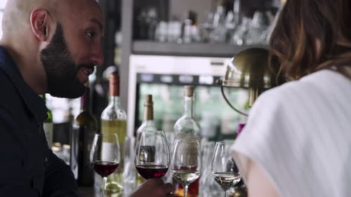 Sommeliers Wine Tasting In Wine Bar