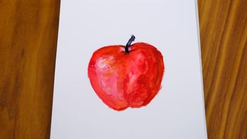Painting of a Red Apple with a Paintbrush