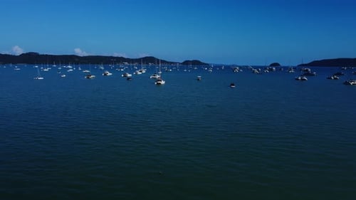 Idyllic Scenery of Sea Harbor with Mountains on Background and Anchored Yachts
