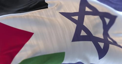 Waving Flags of Palestine and Israel