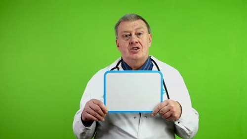 Doctor Holds Blank Whiteboard on Green Screen