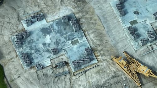 Flat Concrete Slab Foundation Bedding Ready for House Walls and Roof Construction at New Home