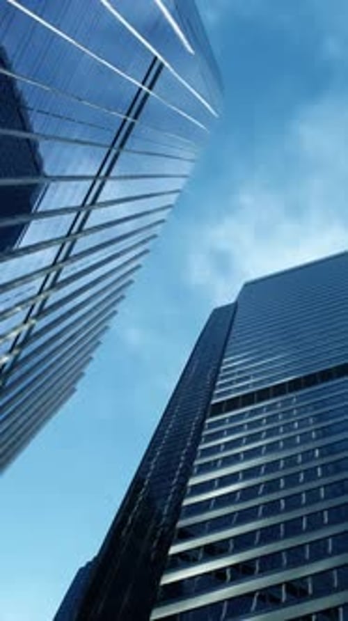 Time lapse of skyline commercial buildings and cloud sky.