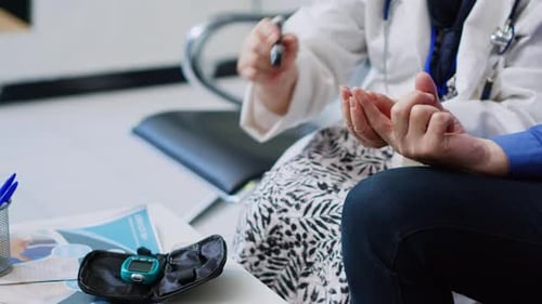 Elderly Medic Taking Insulin Level Test
