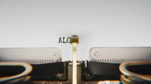 Old mechanical typewriter typing Algorithm in a close-up view.