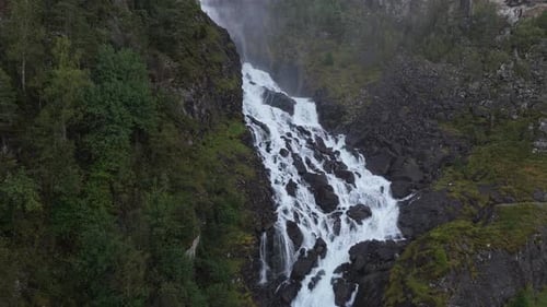 Majestic Latefossen waterfall cascading down cliffs in Norway