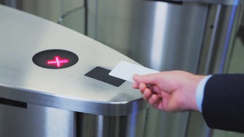 Closeup Man with Contactless Key Passes Through Tourniquet