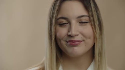 Close Up Portrait of Smiling Blonde Woman Front View of Blueeyed Girl Looking at Camera with Smile