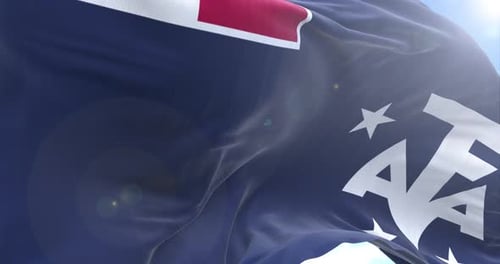 Realistic Waving Flag Logo Reveal on Blue Sky
