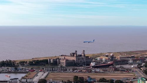 Wide aerial view of airplane descending toward Airport in Buenos Aires, Argentina