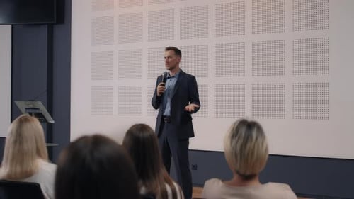 Speech of Male Employee at Business Conference for Office Workers. Speaker Talks