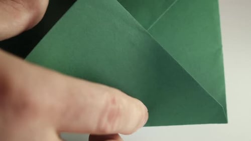 12b. Paper envelope with dollars. The concept of bribery.
