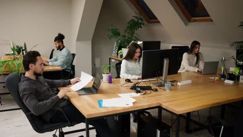 Group of Colleagues Working in Modern Office