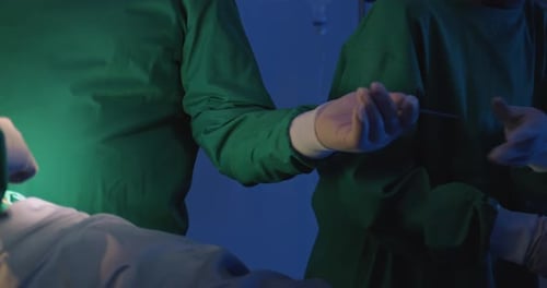 Surgeons Perform Operation in Hospital Operating Room