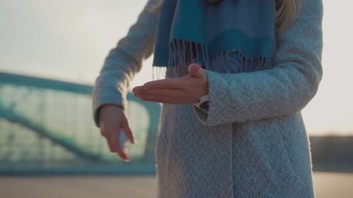 Close Up Hands Woman Sprinkles Antiseptic Sanitizer Spray for Clean and Prevent Disease Bacteria