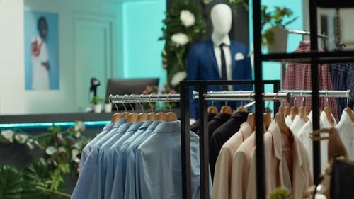 Contemporary Fashion Display in Empty Retail Shop with Variety of Trendy Clothes