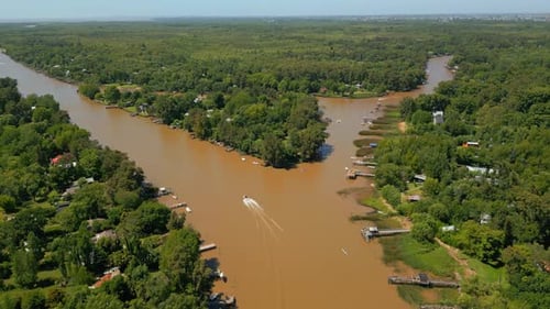 Aerial View of River and Nature with Docks and Boats