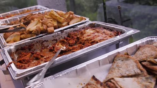 Delicious Food Selection at Outdoor Buffet Table
