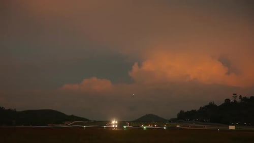 Dawn Over the Runway Airplane Takeoff