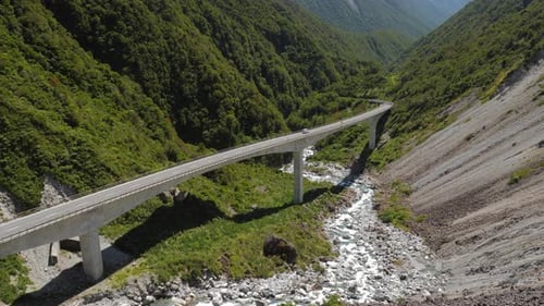 Famous Arthur´s Pass bridge in beautiful national park in New Zealand, static shot in 4K on sunny da