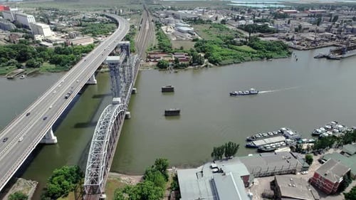 Barges Float on River