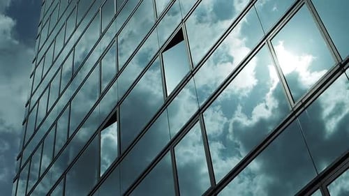 Atemberaubende Reflexionen Blauer Himmel und Wolken in modernem Wolkenkratzerglas