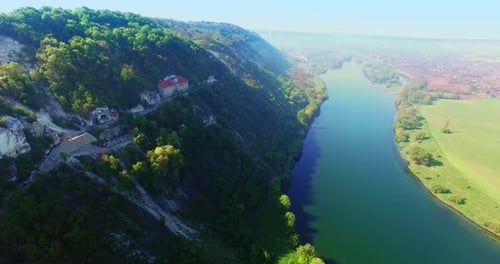 Breath-taking view of a mountain with beautiful river at the foot.