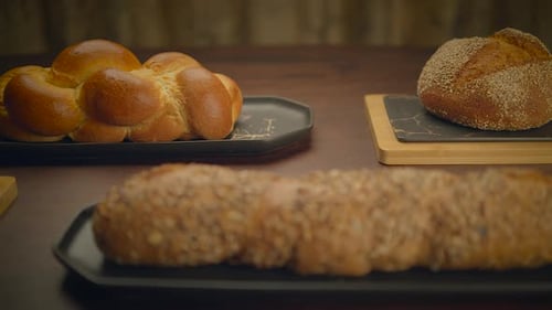 Rustic Bread Display on Serving Trays and Cutting Board