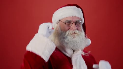 Santa Dancing Merrily in Front of Red Background