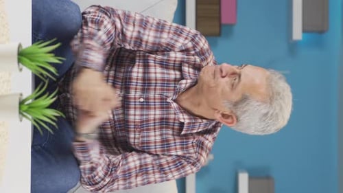 Vertical video of Angry man.