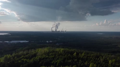 Air Polluting Coal Power Plant With Dramatic Sky - Aerial