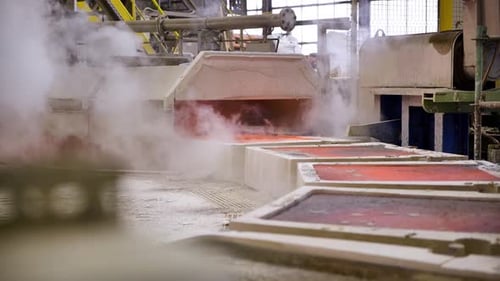 Industrial Machine Processing Hot Molten Material