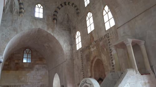 First, we see the hewn stone dome and walls of the Zinciriye Madrasa, and then the camera moves down